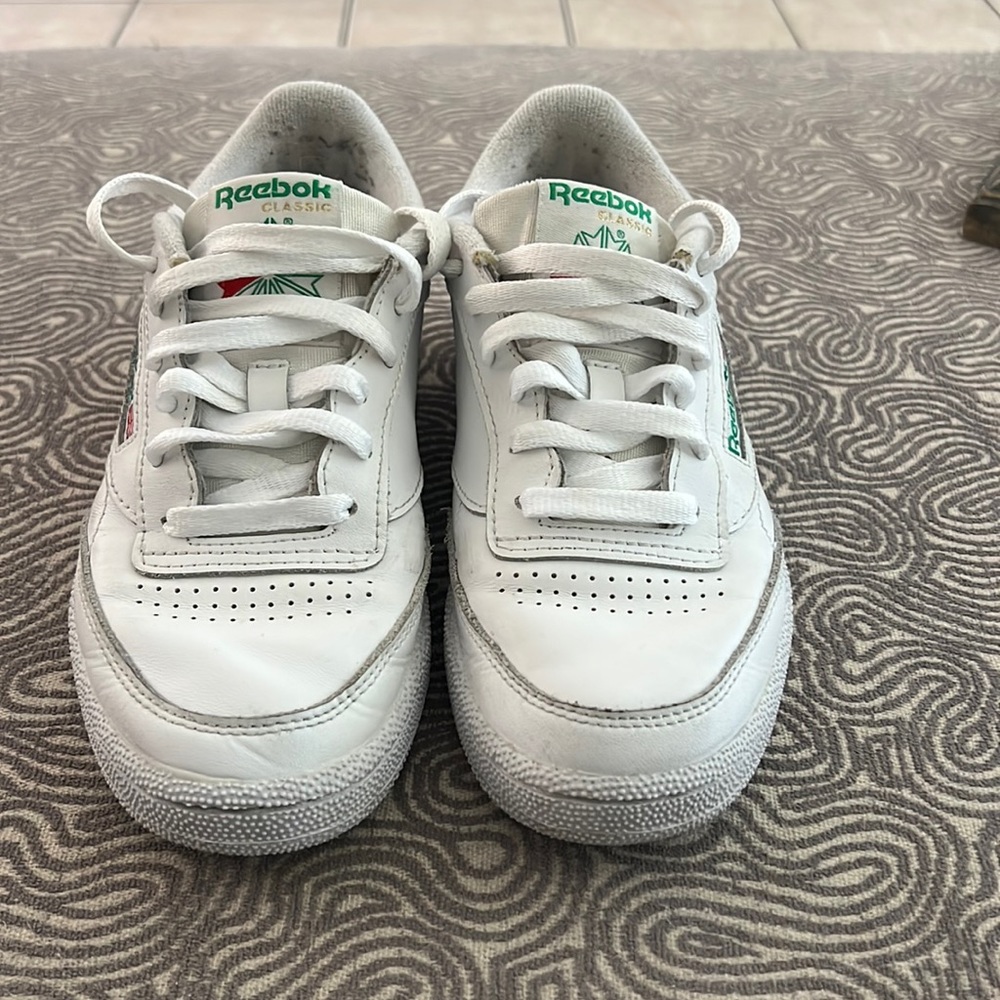 White Reebok Classic Tennis 4 1/2 in mens/boys, 6 women.